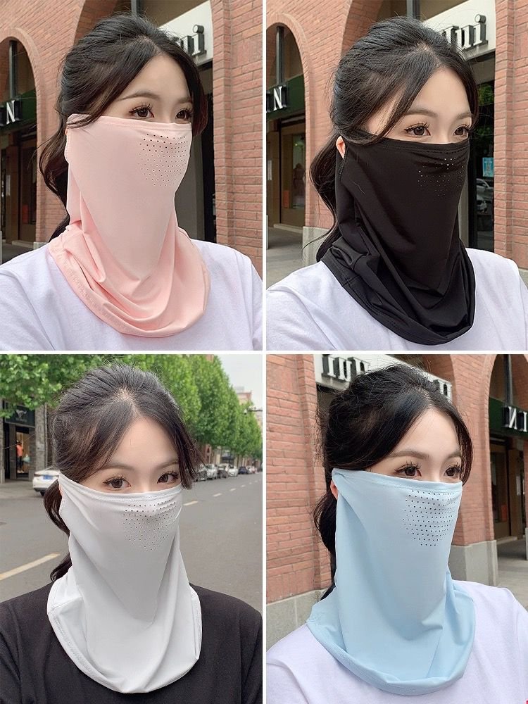 The lady with the tan mask covered her face in the summer's ear veil covered her neck with air