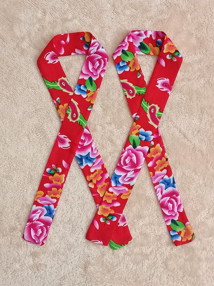 Red and green turbans for children in the northeast