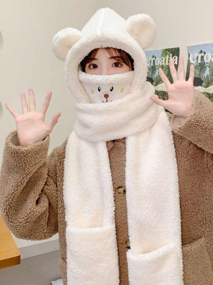 The velvet bear turban girl warms her sweet winter gloves four sets of hoods to cover her ears