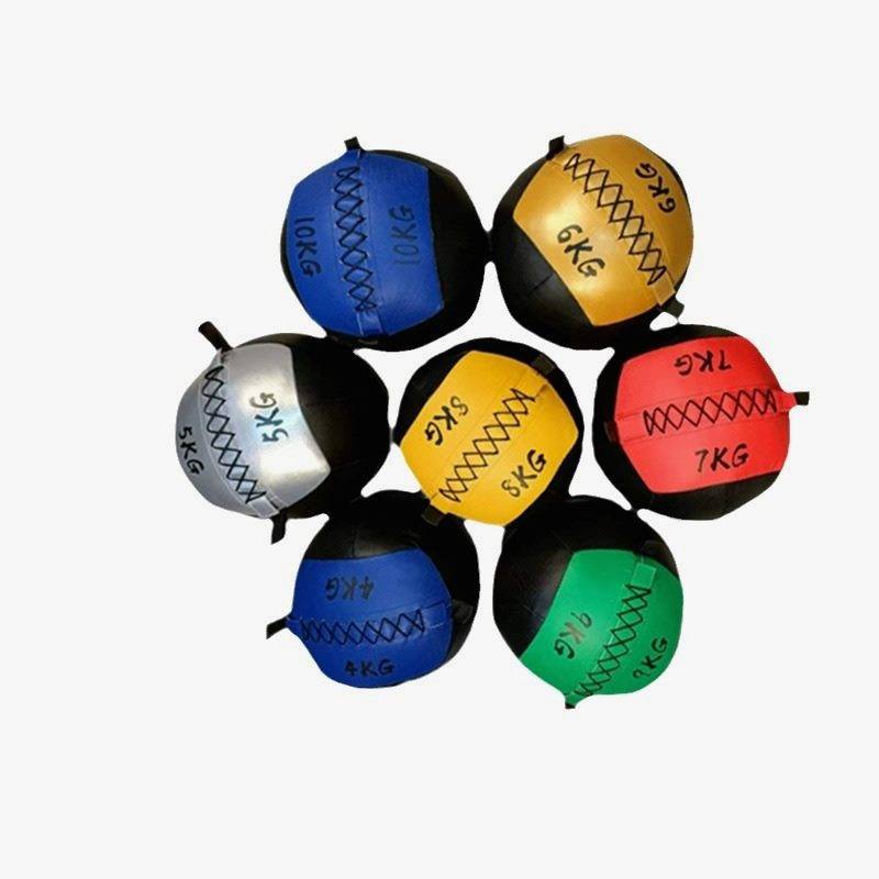 Pharmaball Gymwalls with a heavy ball, a solid softball, double-earth Yoga boxer, gravitational training