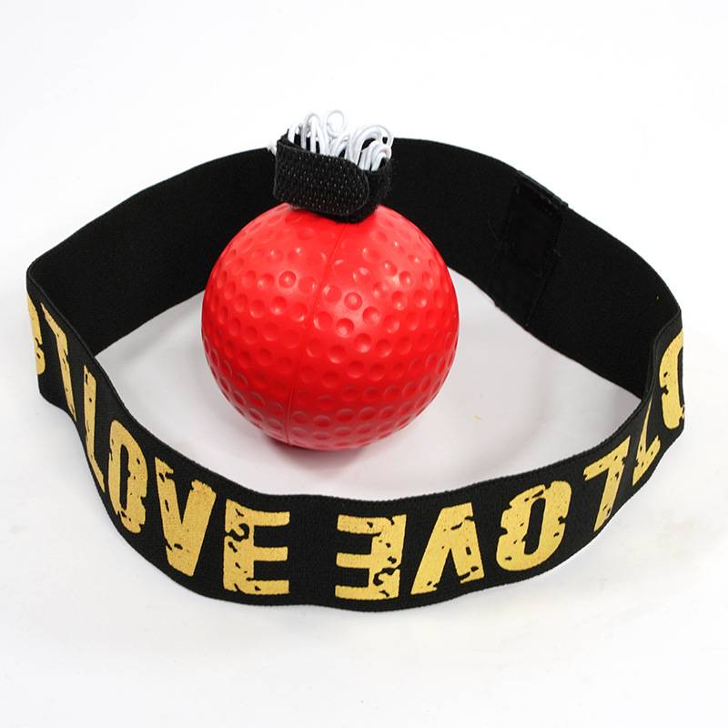 Quickball boxing reflects on the head of a child with a home-based training kit to fight and break out the depressive ball