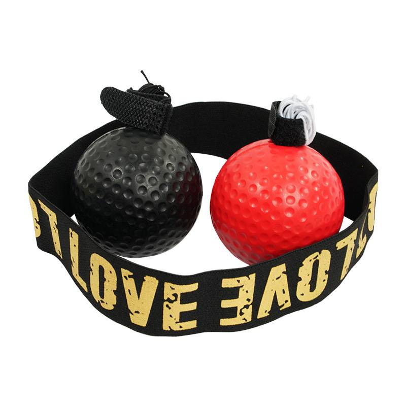 Quickball boxing reflects on the head of a child with a home-based training kit to fight and break out the depressive ball