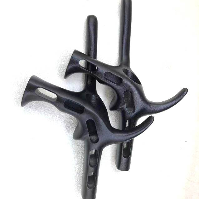 The sword handle of the adult hand