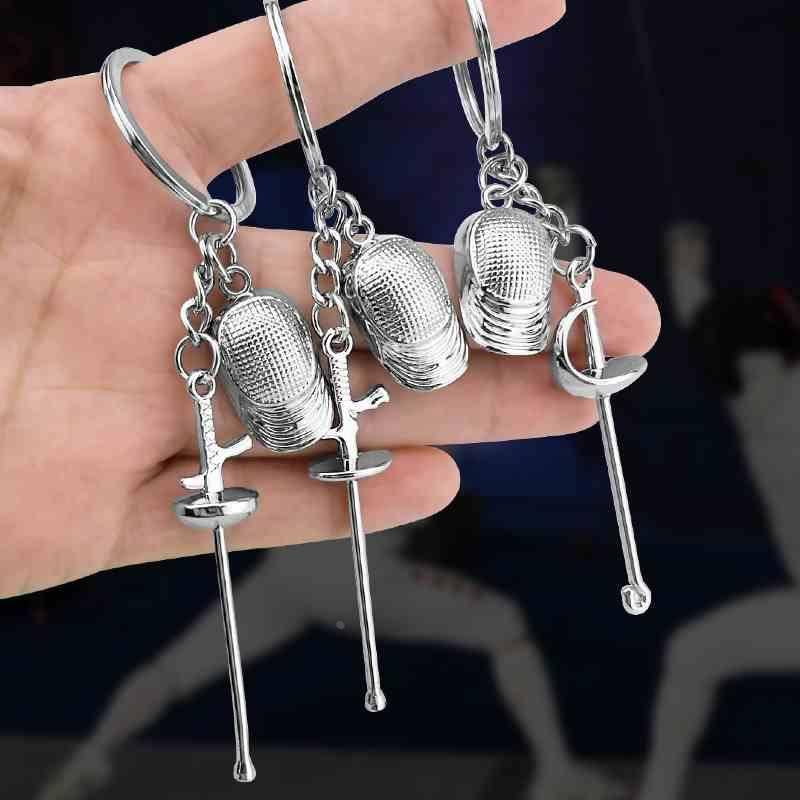 Creative small gift fencing keychain pendant pendant Paris souvenirs flower sword sword sword sword heavy sword sports small pendant