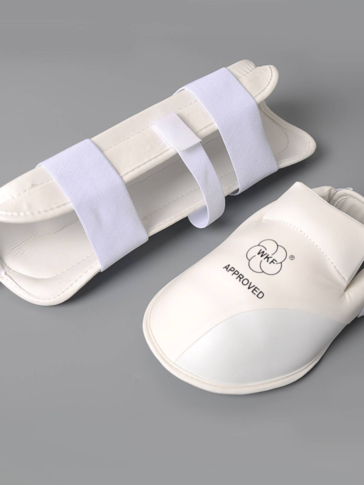 White empty -handed tibial tibial feet, foot, legs, legs, karate, protective tadpole protective legs and legs. Adult karate leg protection