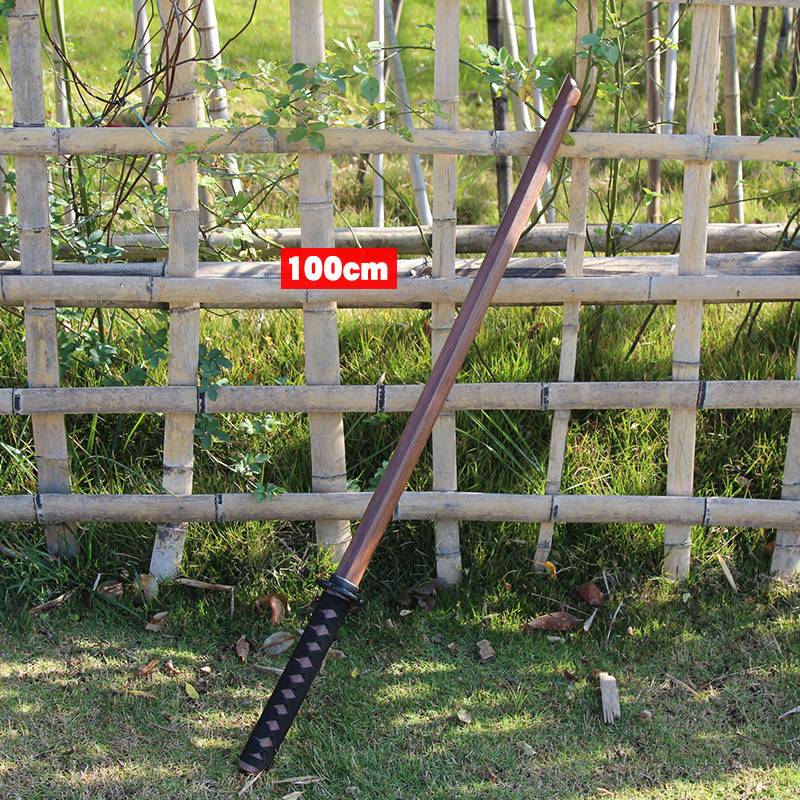 A 100-cm tan wooden knife