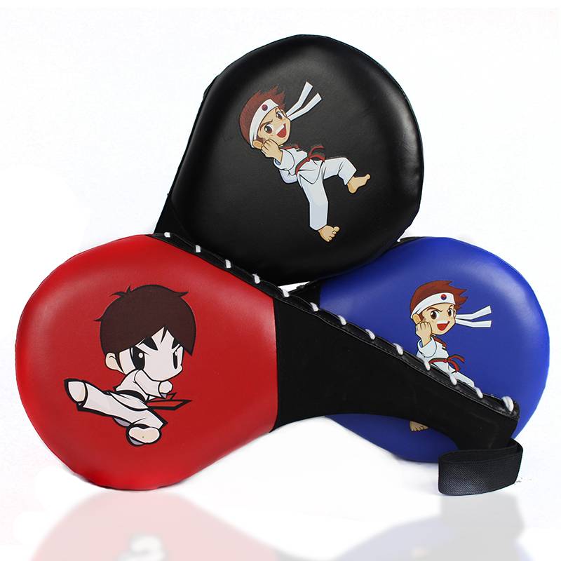 Taekwondo kicks kick-off children with training equipment and goal-shooters with kick-off chicken legs