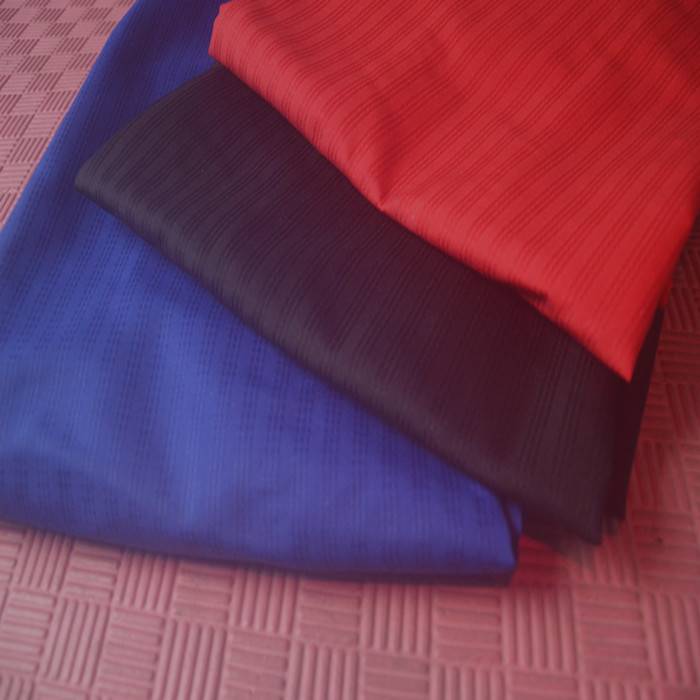 Three -line fabric taekwondo pants black trousers red blue trousers single pants Wing Chun boxing pants