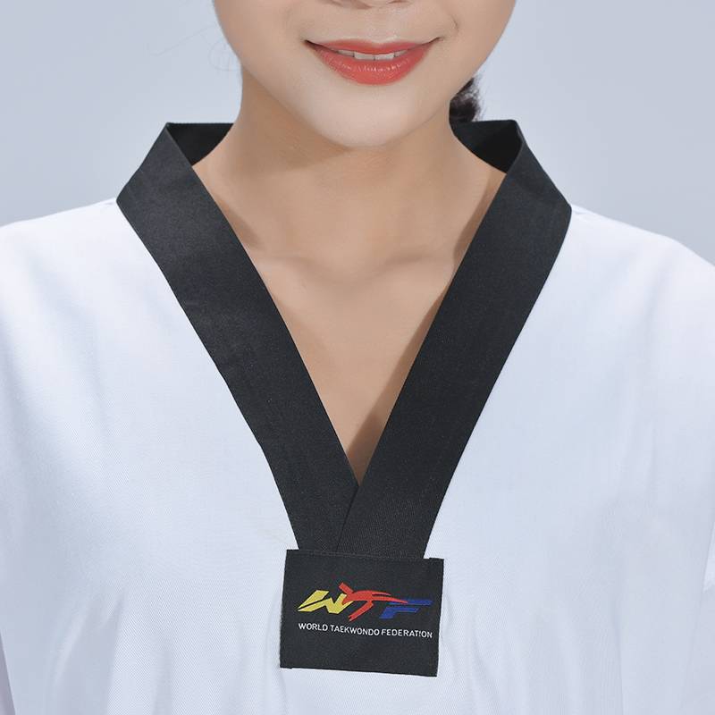 Taekwondo wears a child's long-sleeved, cotton-skinned, adult student beginners, black coaches, male and female short sleeves