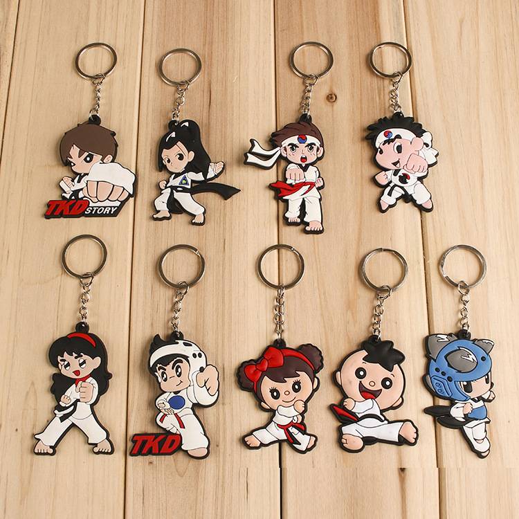 THE KEY TO TAEKWONDO IS ATTACHED TO A SMALL GIFT SET