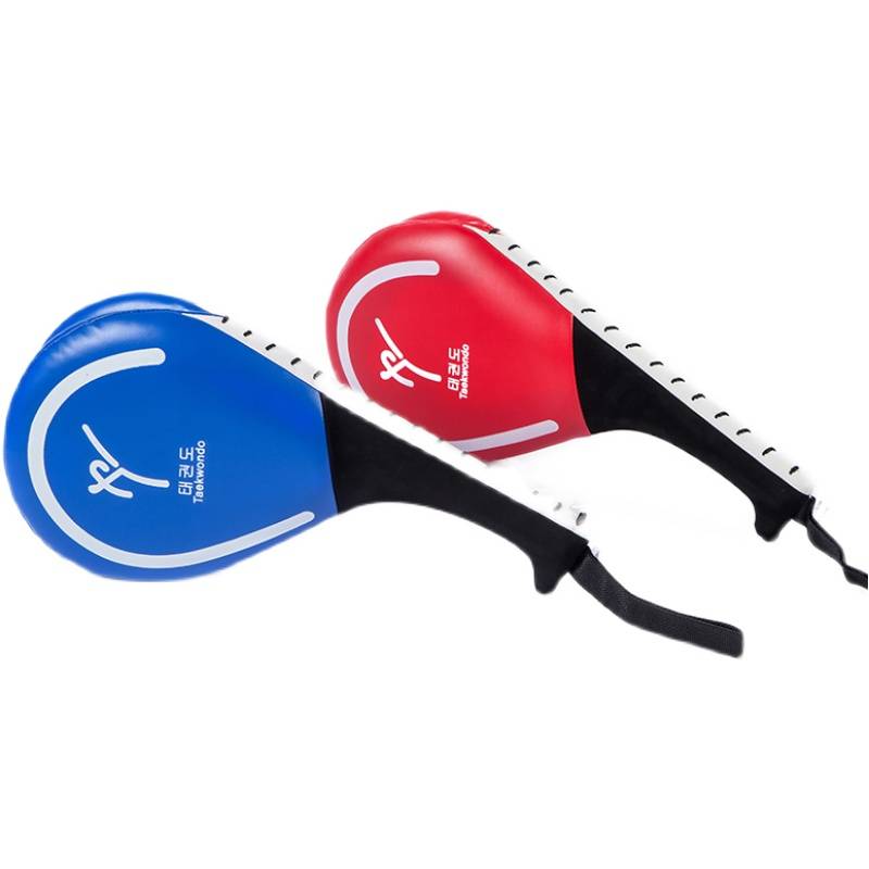 Taekwondo training equipment for children with kicks and kicks and kicks to the target's home with a banging Thai fist and a chicken leg