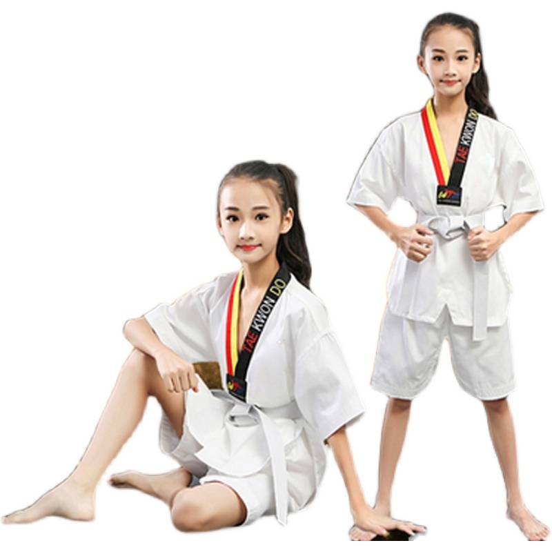 Taekwondo children trained in adult taekwondo clothes for men and women with short sleeves