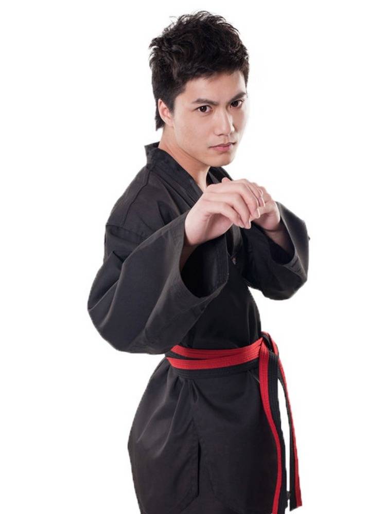 Taft coach wears a black taekwondo for adults and a master in a specialty taekwondo for men and women