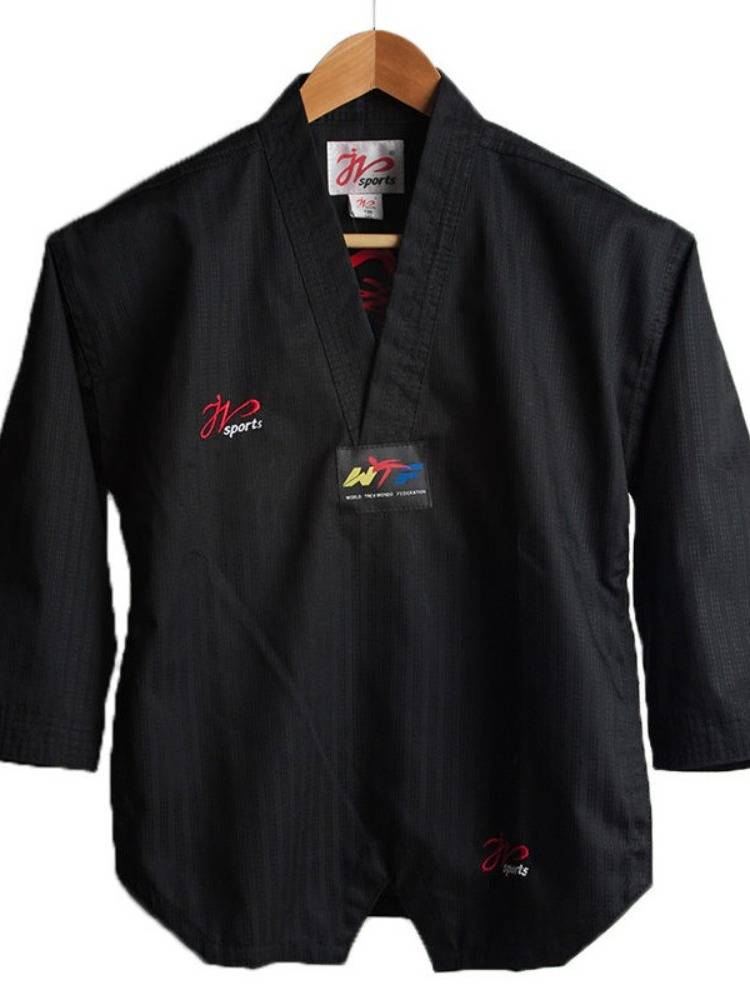 Taft coach wears a black taekwondo for adults and a master in a specialty taekwondo for men and women