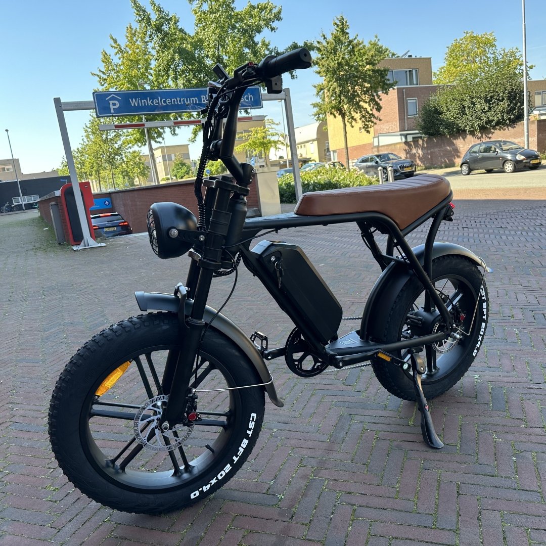 15Ah Lithium Battery Power Ebike with 7 Speed 20*4.0 Inch Fat Tire Electric Mountain Bike OUXI V8