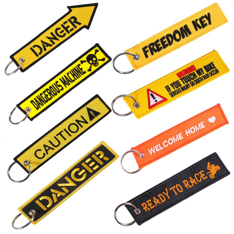 Embroidered key chain for motorcycles, scooters, cars, and gifts. Ideal for sportbike bags and backpacks. Remove before flight.