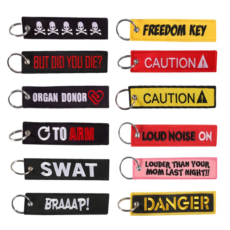 Embroidered key chain for motorcycles, scooters, cars, and gifts. Ideal for sportbike bags and backpacks. Remove before flight.