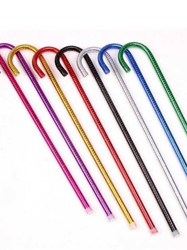 Jazz dance with a cane -of -belly dance performance of a crutch Children's young children dancing big eyes color dance stick