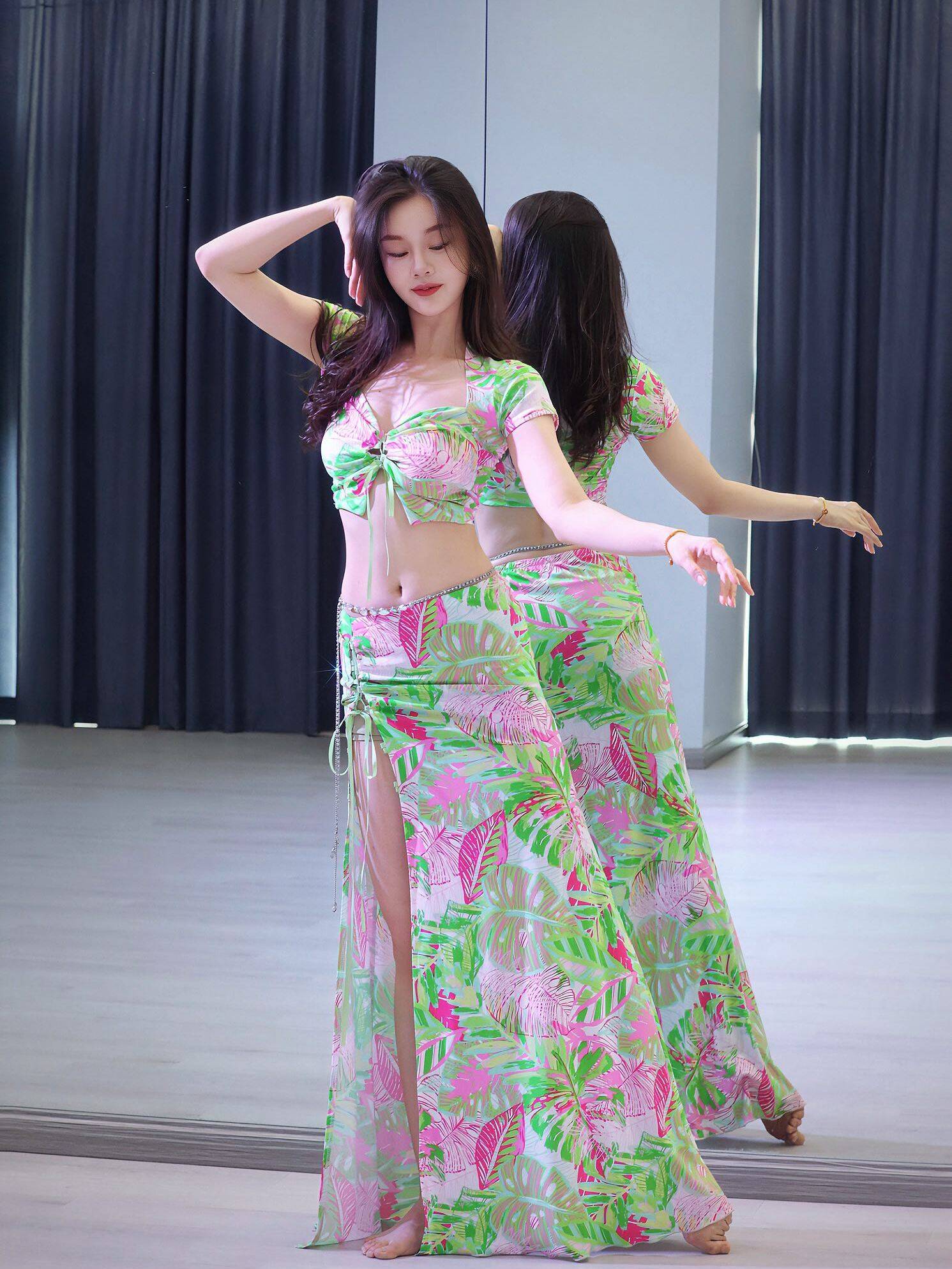Lucy's belly belt, a green ribbon, a new white belly, and an Eastern dance