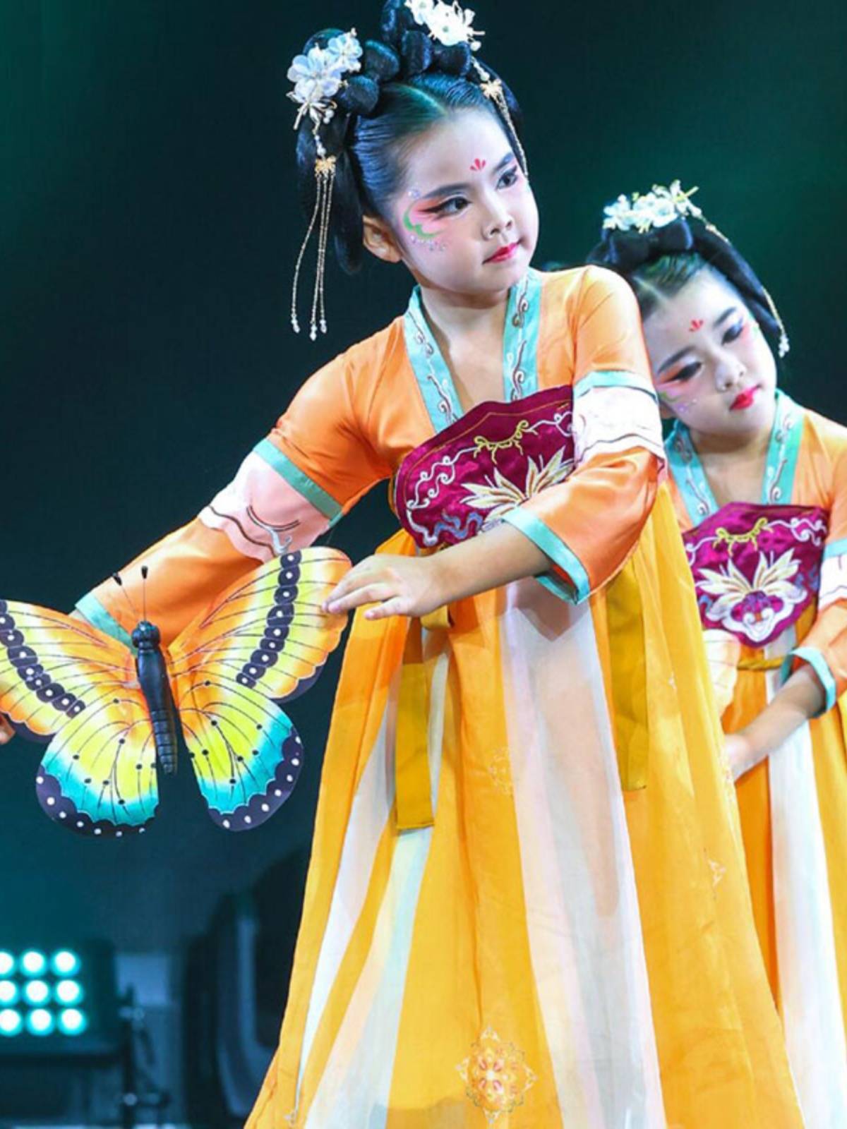 The same 6-1 children performing in the Intoxicated Windshow and the Classic Butterfly Dress