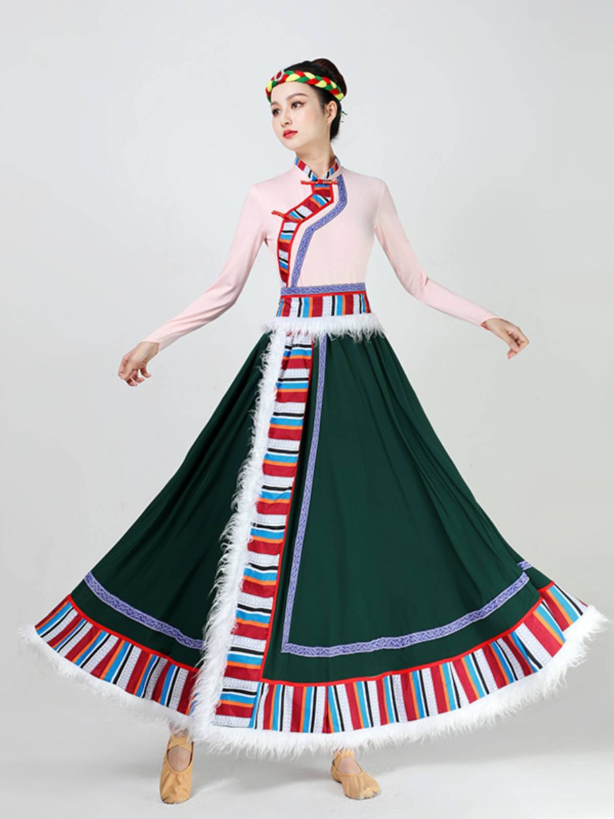 The Tibetan dance show for adult half-dressed women, wearing a Mongol dress