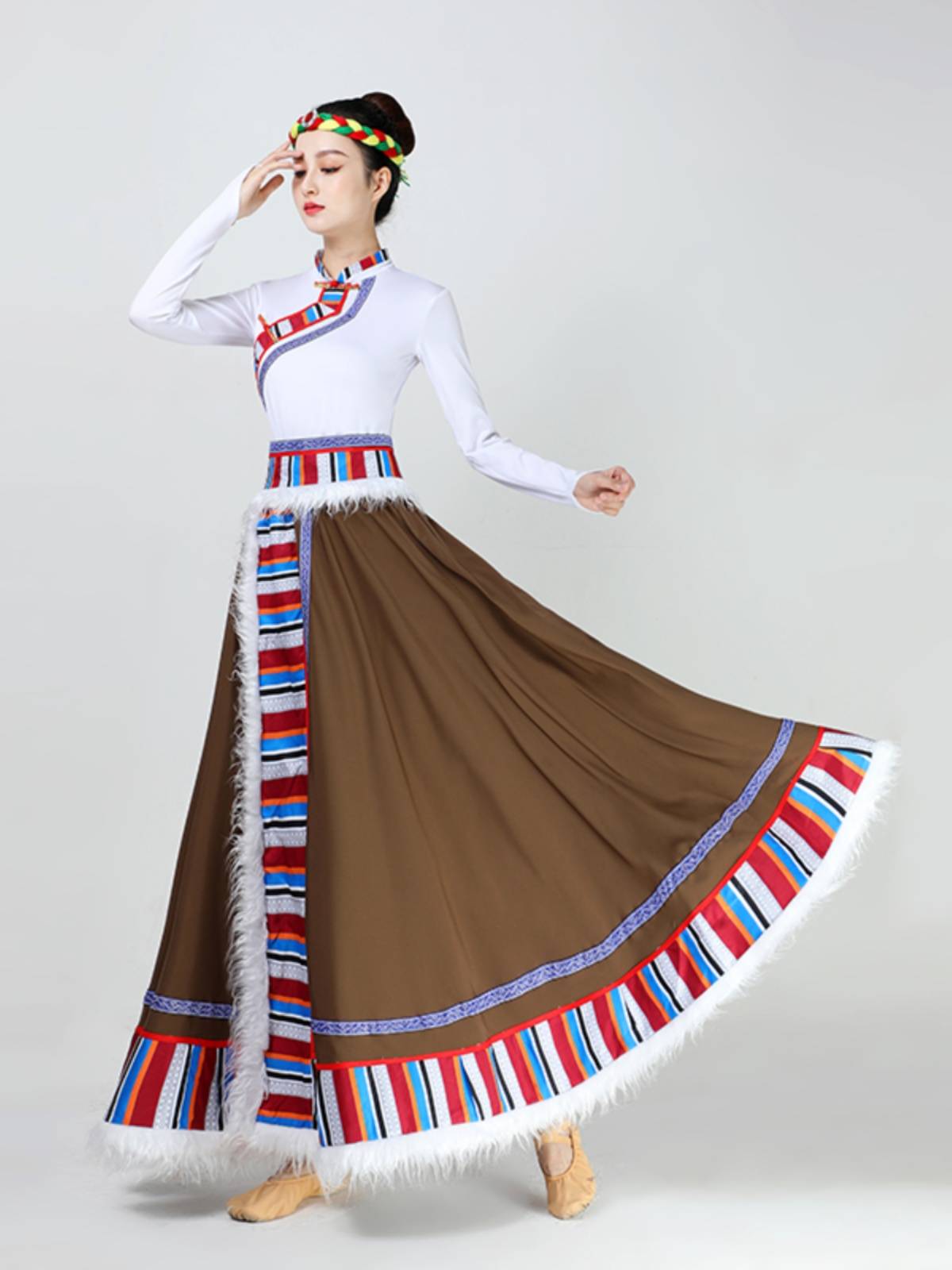 The Tibetan dance show for adult half-dressed women, wearing a Mongol dress