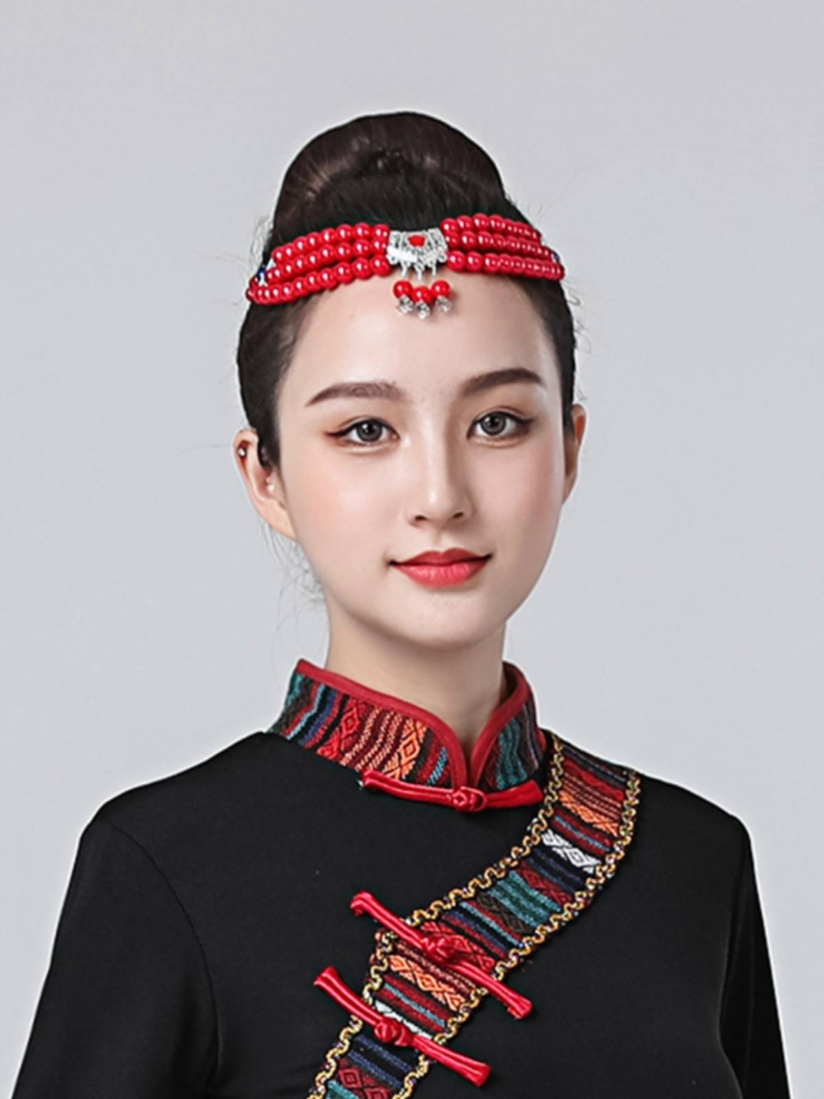 Mongol heads and a new collection of ethnic-minority dancers performing hand-chorus dance costumes