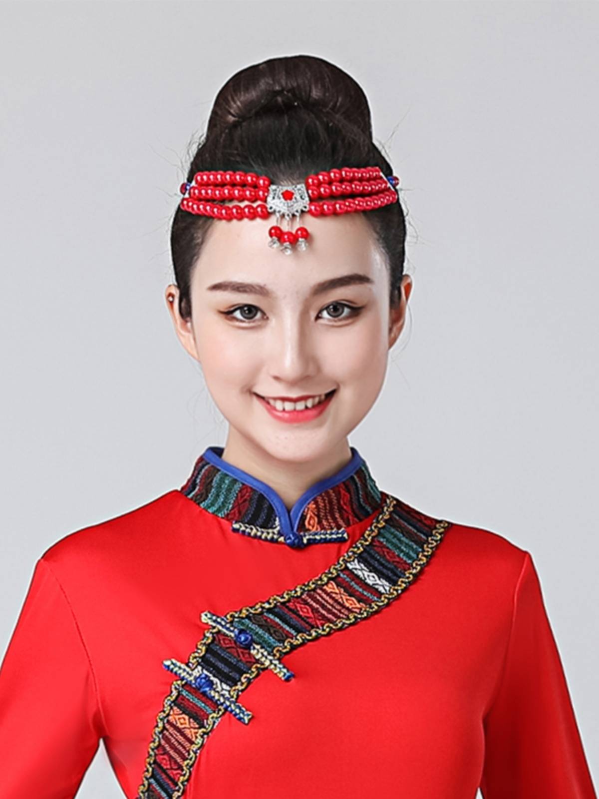 Mongol heads and a new collection of ethnic-minority dancers performing hand-chorus dance costumes