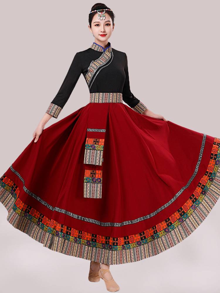 The Tibetan dance show with two pairs of a new national-style dress