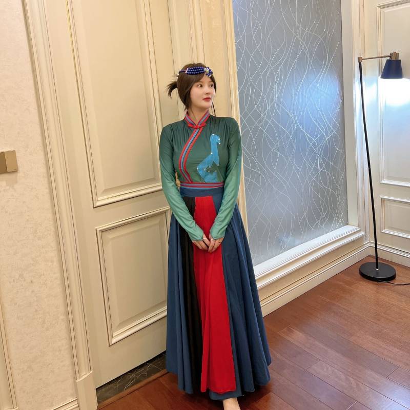 Mongol dress examination for the ethnic minority performing a Tibetan adult Monk dance dress exercise with a large skirt