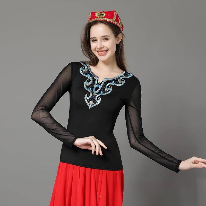 The new Xinjiang dance service girl practicing Uyghur performance clothes shirt, showing ethnic minority clothing