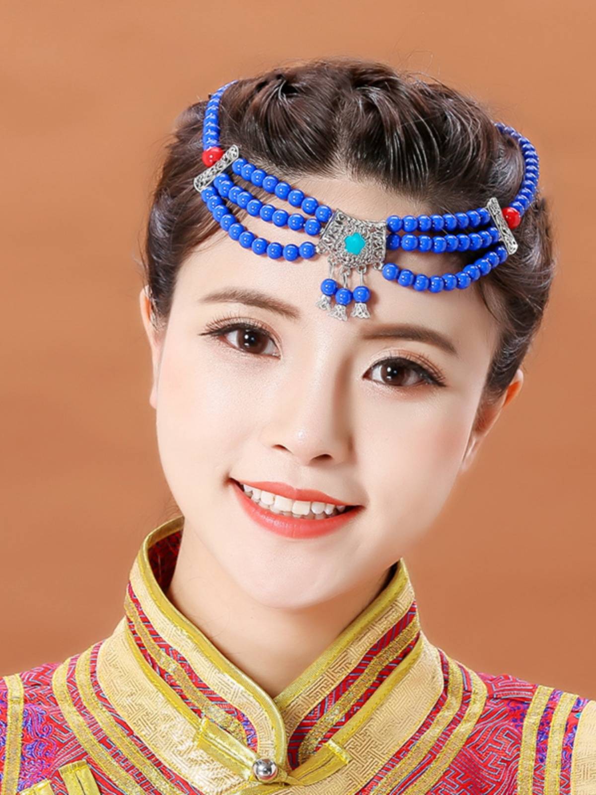Mongol heads and a new collection of ethnic-minority dancers performing hand-chorus dance costumes