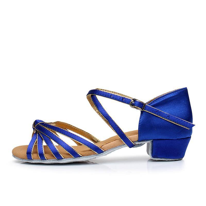 The high-end blue Latin-shoe girl dances on the soft bottoms of her hands with a grown-up national dance cowboy