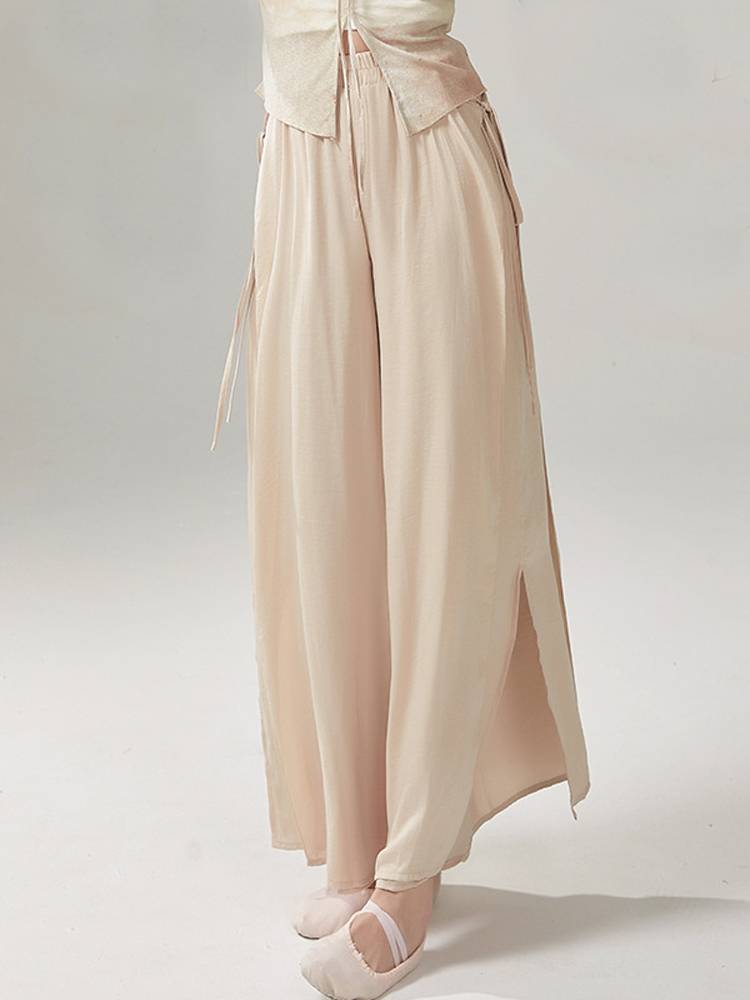Flying with a classic modern dance exam with a broad-legged pants on the side