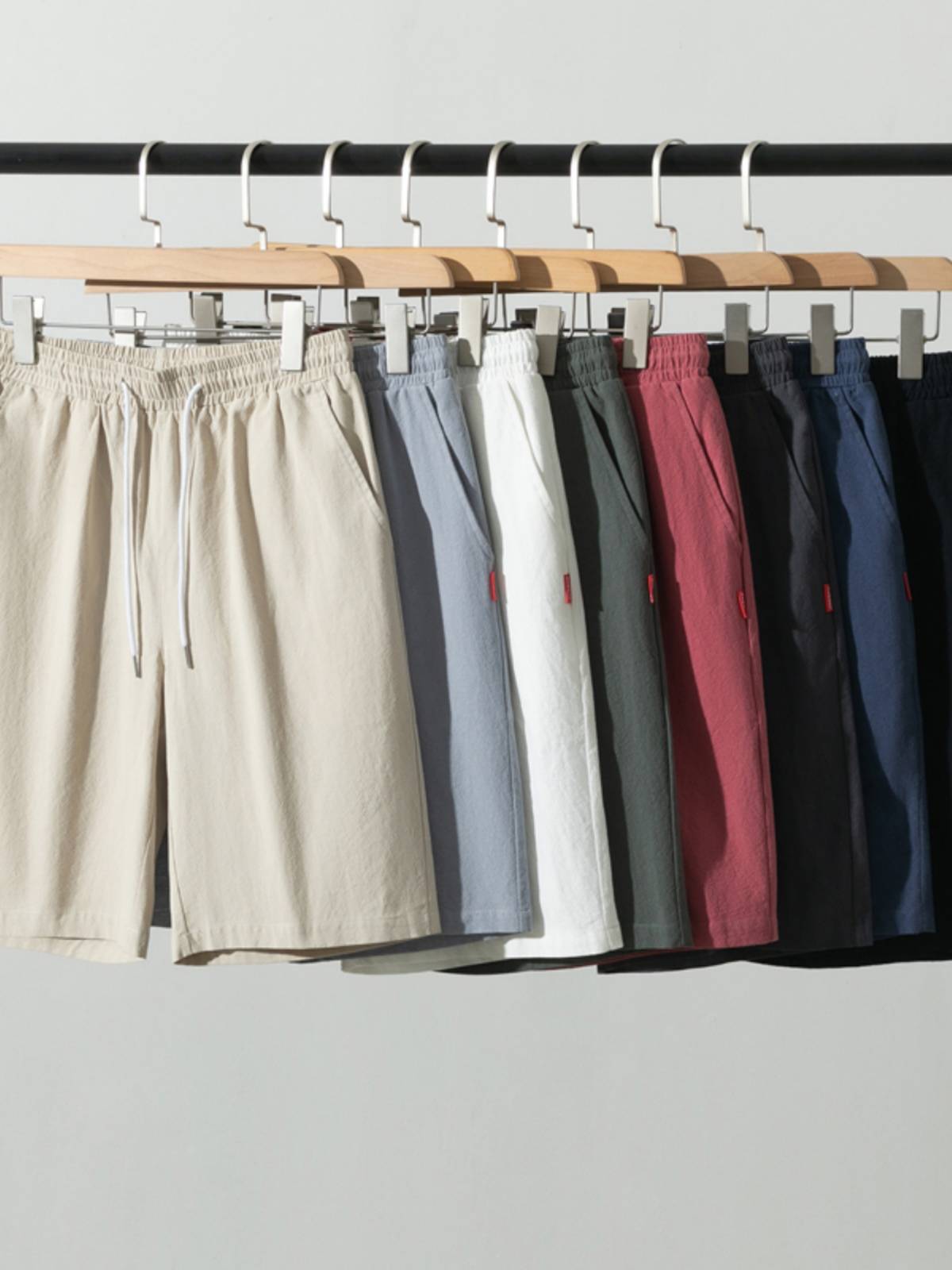 Summer new five -point work shorts, men's sports casual straight tube trend pure color beach pants large size horse pants