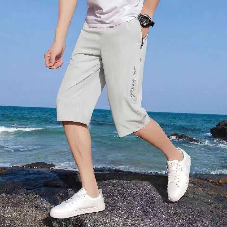 Short pants men's summer cropped pants thin leisure sports loose beach pants big pants horse pants men's pants tide running