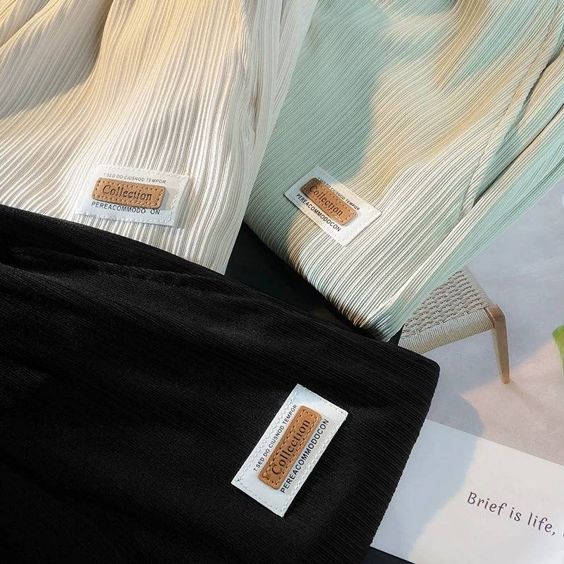 Mall counter large -name clearance leakage casual shorts men's summer ice silk loose sports five -point horse pants tide card