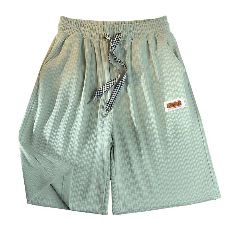 Mall counter large -name clearance leakage casual shorts men's summer ice silk loose sports five -point horse pants tide card