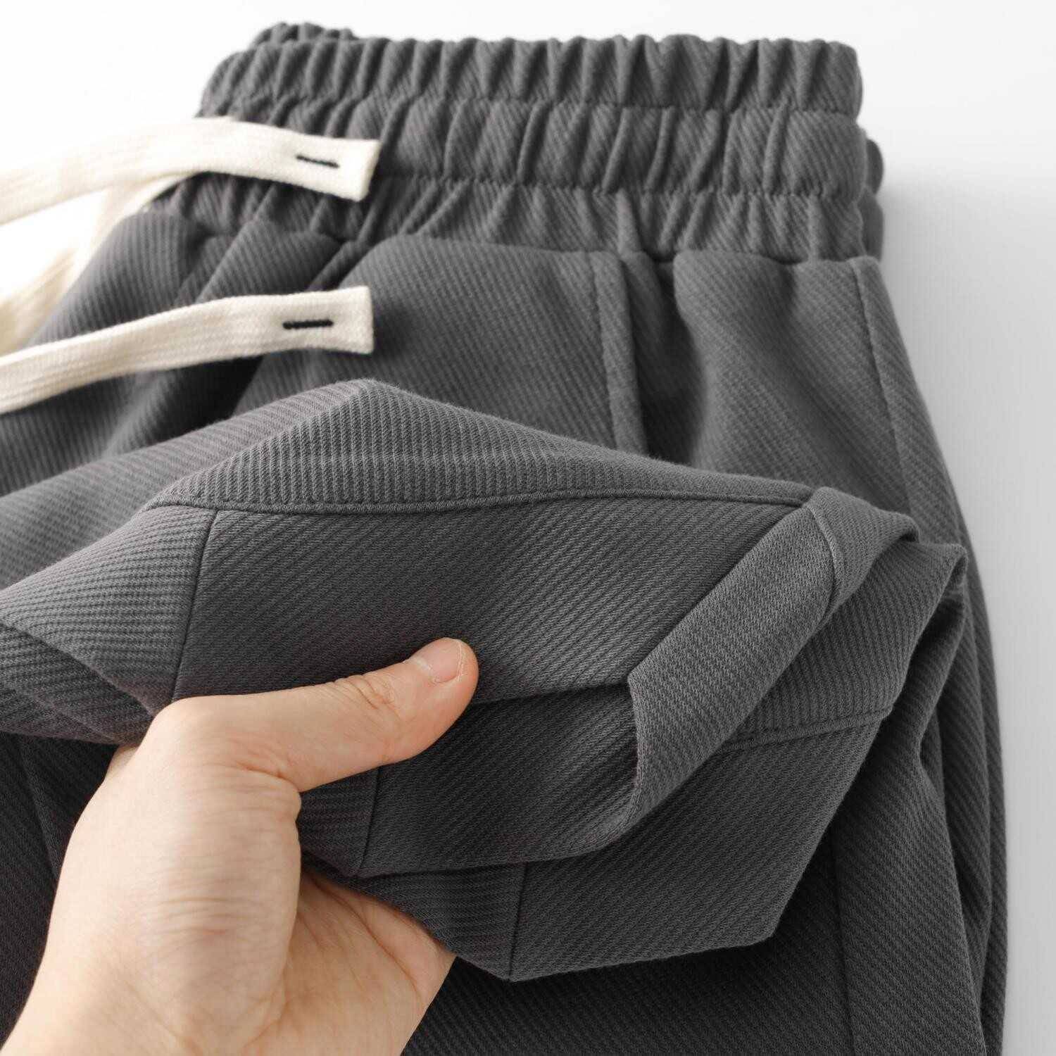 Clear warehouse leak ~ Men's loose sports beach pants young handsome leisure 5 -point pants anti -hot -resistant horse pants