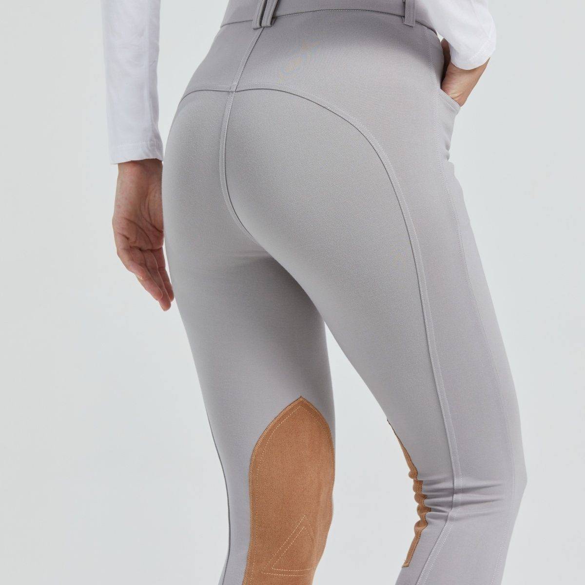 Half-skinned children in horse-suits and scooter-proof sports pants dry on horse-pants and summer-pants on horse-pants