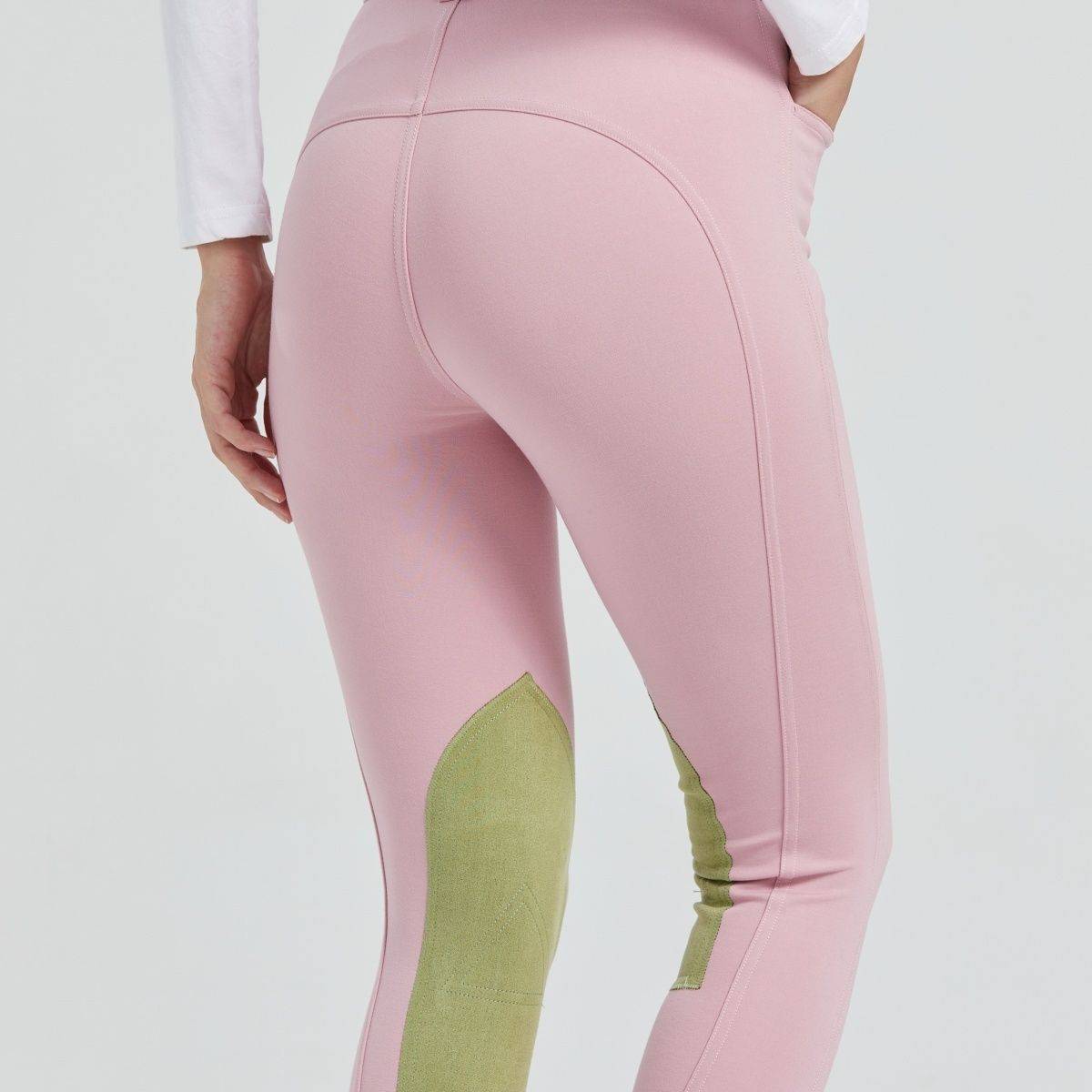 Half-skinned children in horse-suits and scooter-proof sports pants dry on horse-pants and summer-pants on horse-pants