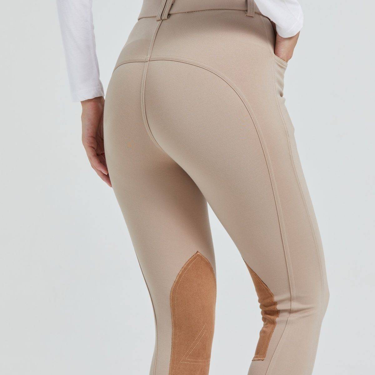Half-skinned children in horse-suits and scooter-proof sports pants dry on horse-pants and summer-pants on horse-pants