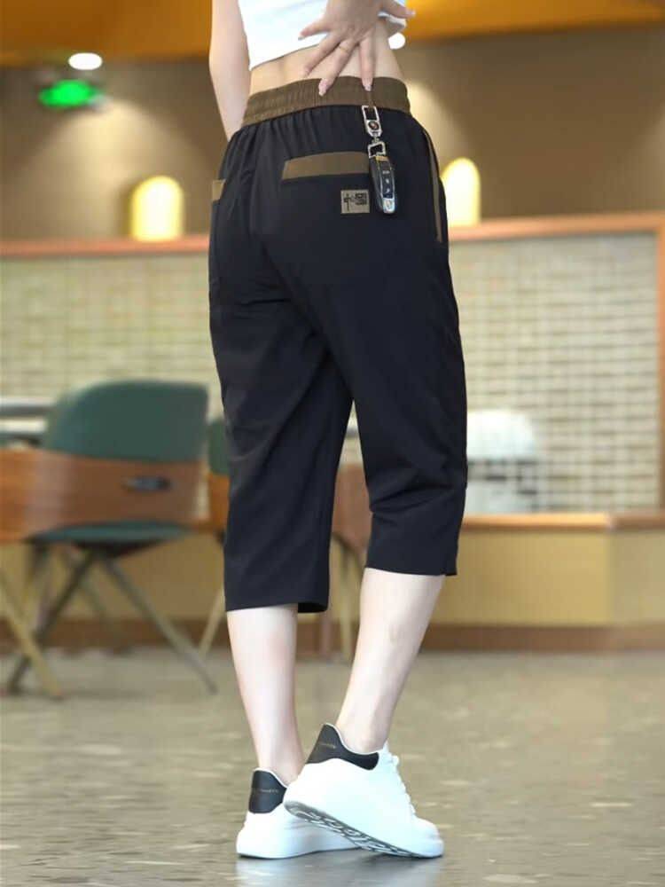Ice silk seven -point pants men's summer thin loose and fast dry wearing middle pants men's pants sports casual shorts