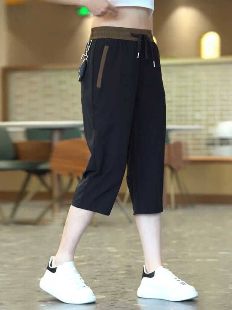 Ice silk seven -point pants men's summer thin loose and fast dry wearing middle pants men's pants sports casual shorts