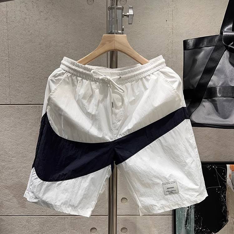 Short pants men's summer tide brand color matching loose casual mid -pants, men's sports speed dry sand beach penta pants workmanship