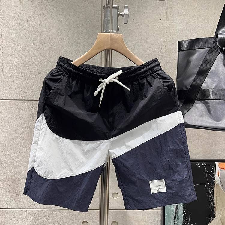 Short pants men's summer tide brand color matching loose casual mid -pants, men's sports speed dry sand beach penta pants workmanship