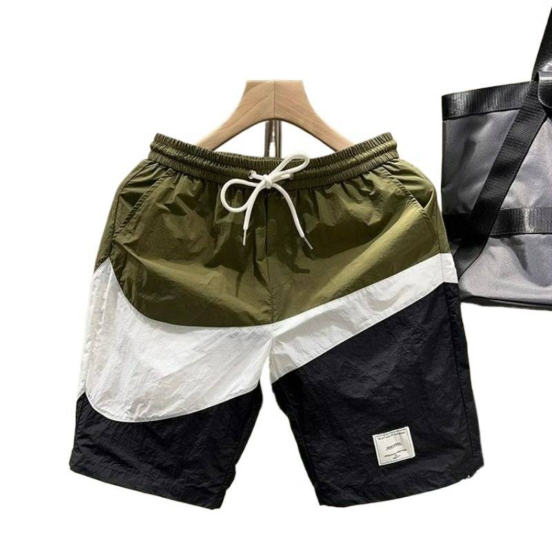 Short pants men's summer tide brand color matching loose casual mid -pants, men's sports speed dry sand beach penta pants workmanship