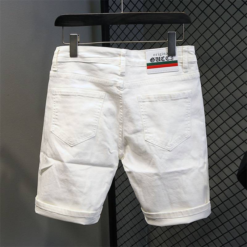 Summer thin denim shorts, men's white hot drill five -point European version of trendy slim pants pants pants pants