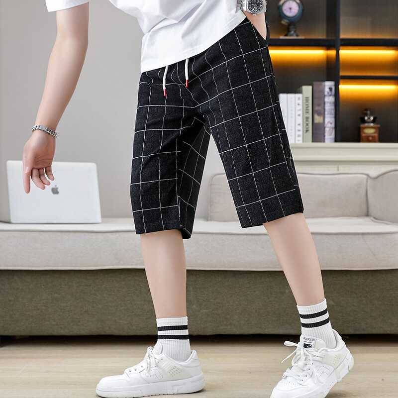Summer men's cropped pants elastic shorts fashion casual slimming pants trend checkered grid horse pants pork pants men