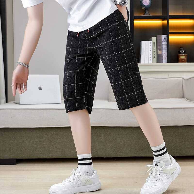 Summer men's cropped pants elastic shorts fashion casual slimming pants trend checkered grid horse pants pork pants men